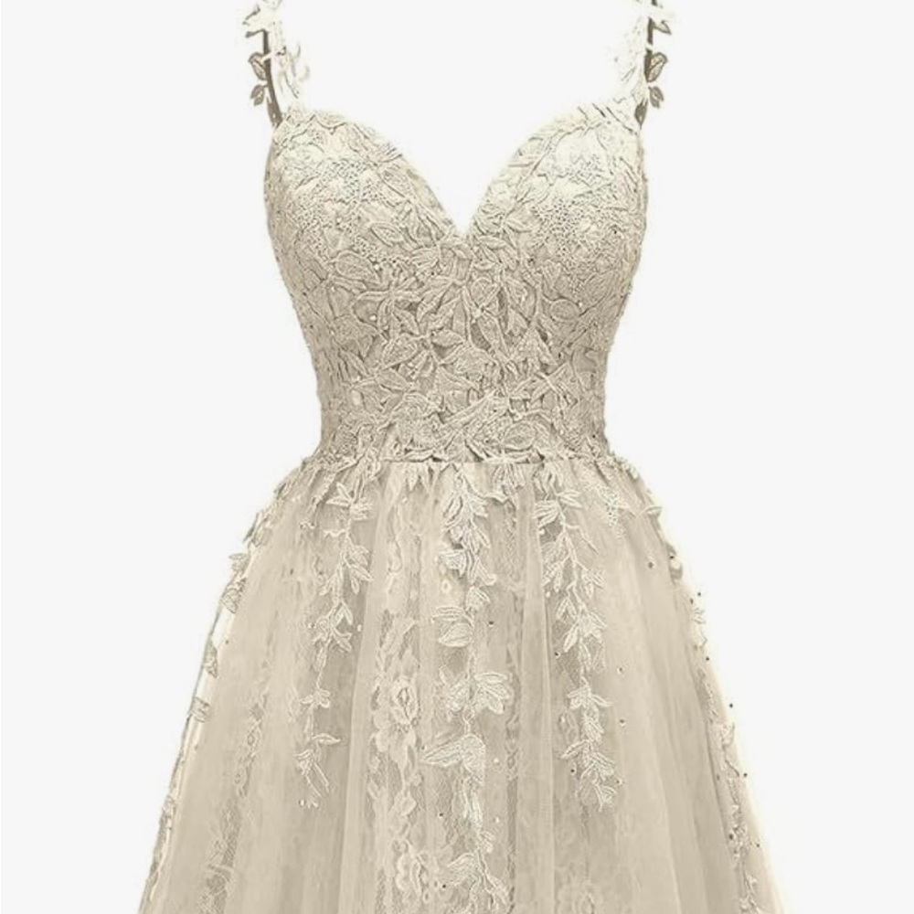 Prom./Homecoming./Wedding dress. Knee length.Beautiful flower and sequins on top